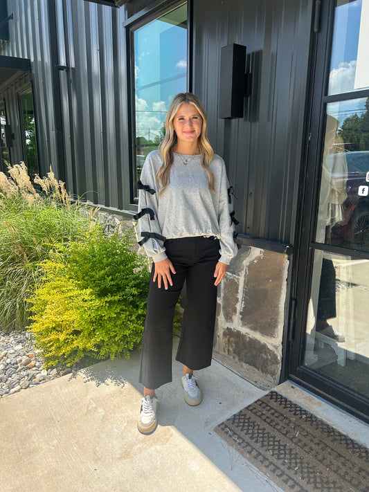 Heather Grey Sweatshirt With Black Bows on Sleeves