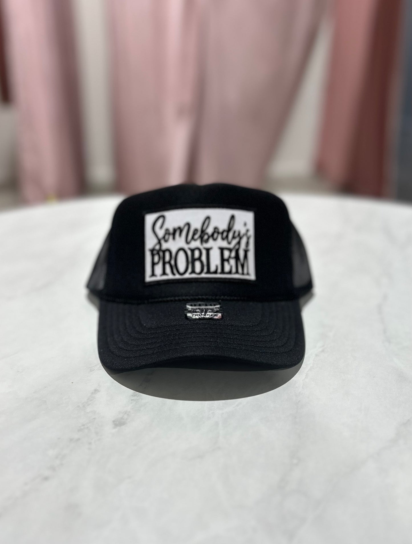 Somebody's Problem Trucker Hat