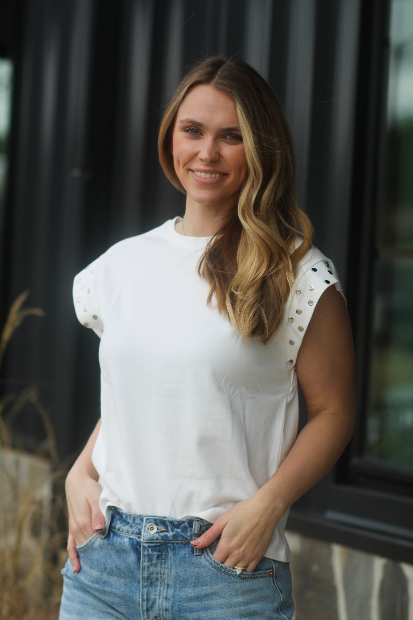 White top With Silver Buttons on Sleeves